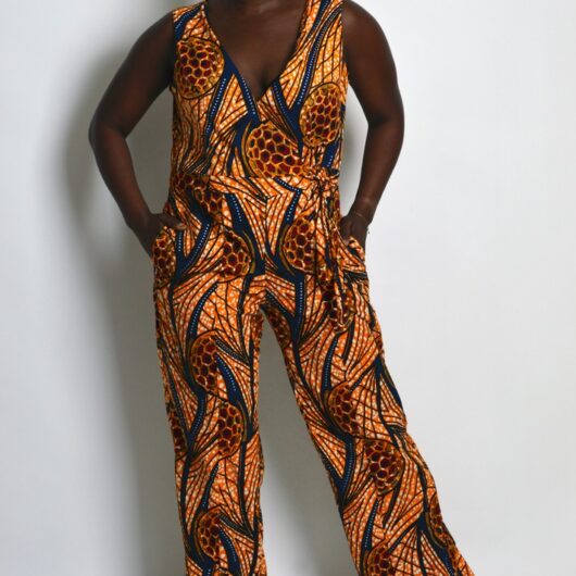 orange ankara jumpsuit with v neck and zipper front and side pockets