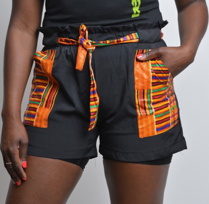 black shorts with african print patch pockets and belt