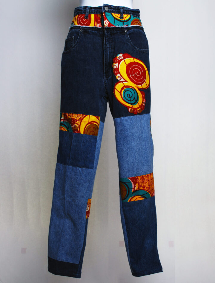 faded jeans pants with ankara patches around the waist and legs