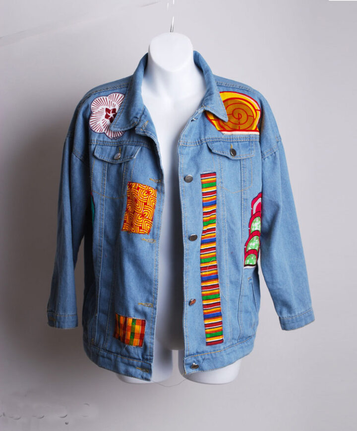 light blue jeans jacket with african print patches