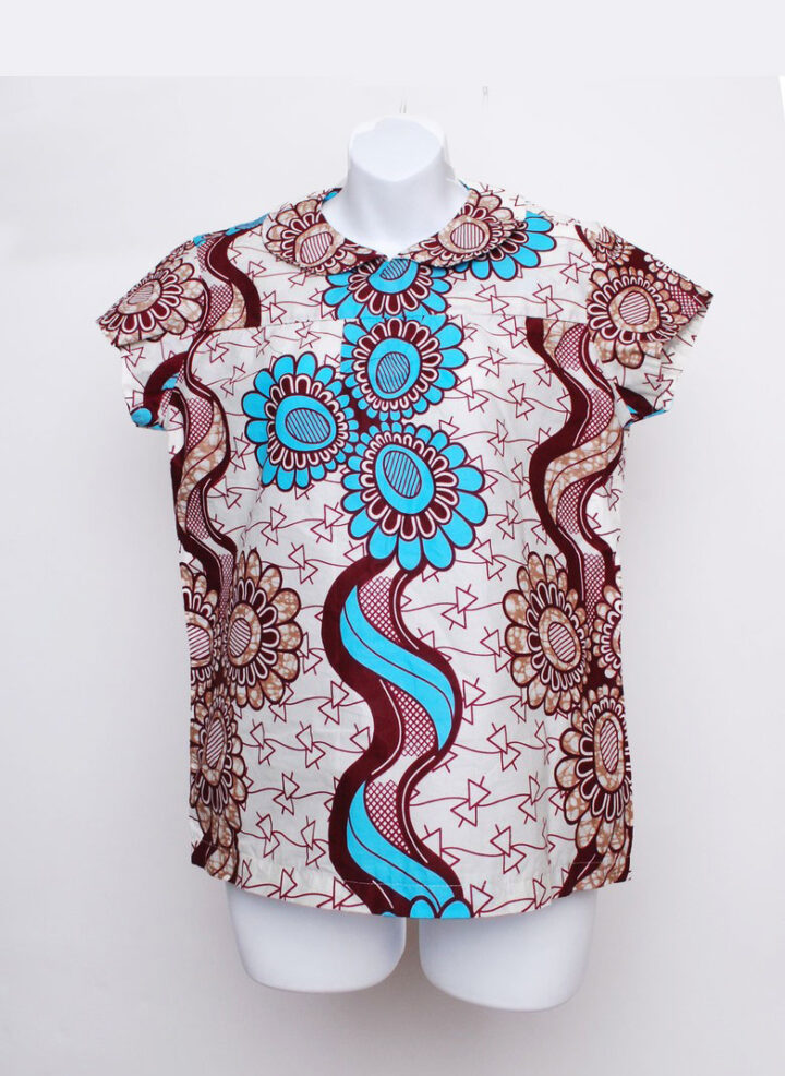 ivory color african print blouse with cap sleeves