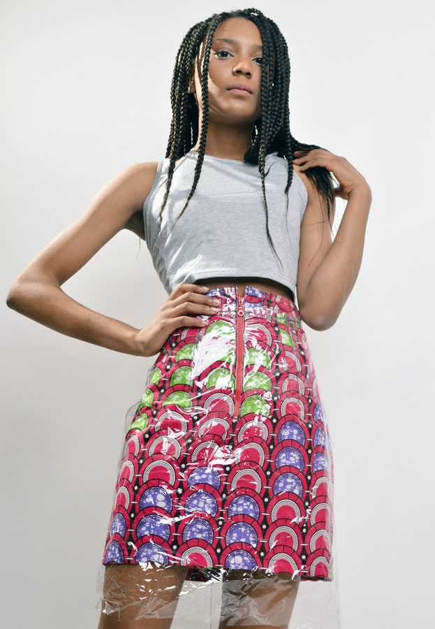 casual pose clear vinyl skirt overlay with african print pencil skirt