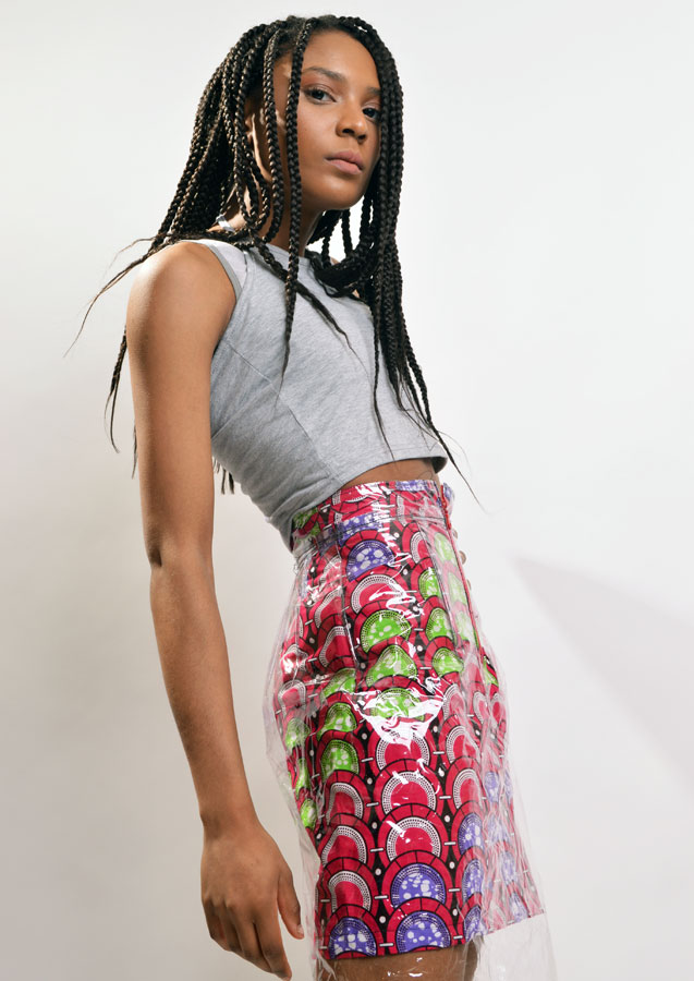 side view clear vinyl skirt overlay with african print pencil skirt