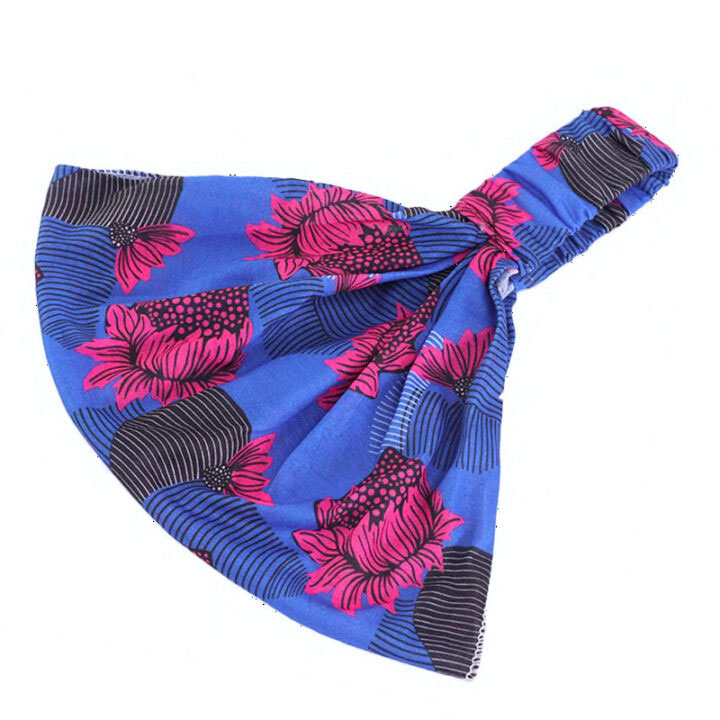 blue and red stretch african print headband with elastic on the front
