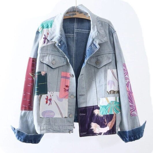 faded jeans jacket with applique exotic print patches