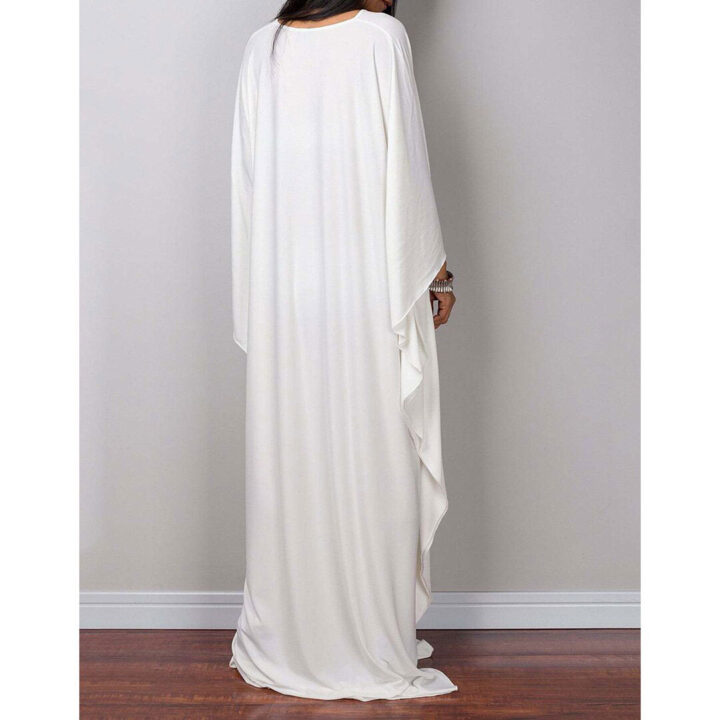 back view of a loose fitting floor length robe with long sleeves